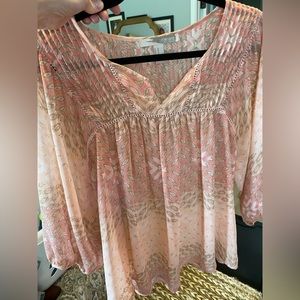 Blush and tan blouse.